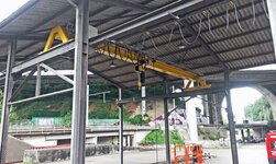 Obergurtlaufkran mit Elektrokettenzug in Aussenlager