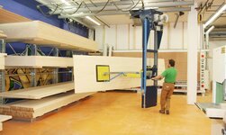 Kransystem für das rationelle Ein- und Auslagern von Platten sowie Paletten im Warenlager
